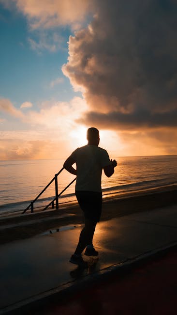 Человек в беговой экипировке на старте